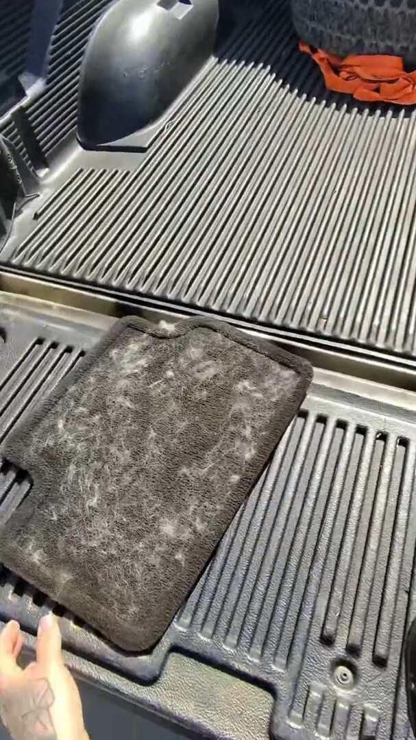 Removing fur from a car floor mat